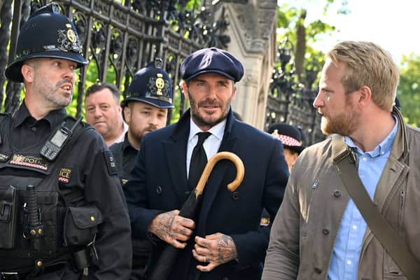 David Beckham queued around 12 hours to walk past Queen Elizabeth II’s coffin. Credit: Getty Images.