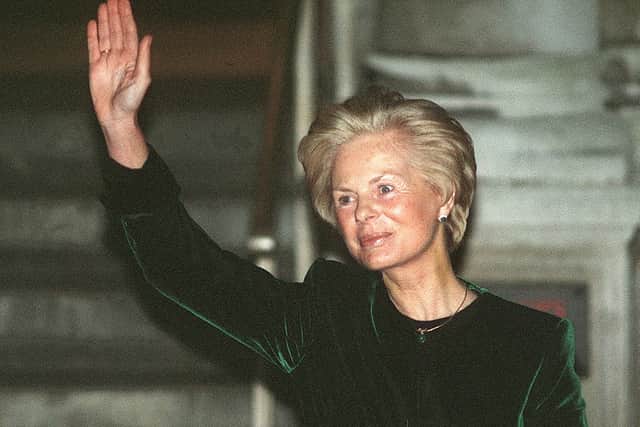 The Duchess of Kent waves to the media in 1994.