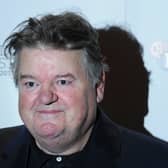 British actor Robbie Coltrane attends a photocall for the film Great Expectations in central London on October 21, 2012.  