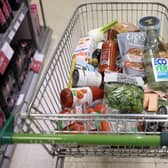 A shopping trolley is pictured at a Waitrose supermarket in London. 