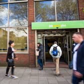 People walk near the Job Centre in Westminster.