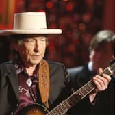 Bob Dylan has issued a rare public apology for selling books with automated signatures.  