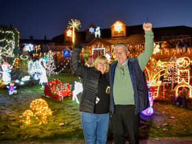 Malcolm Molloy, 64, and his wife Wendy, 62, from Worcestershire wow their neighbours with Christmas lights every year