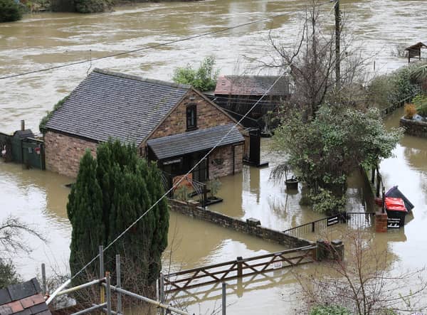 <p>Houses in Ironbridge surrounded by flood waters as River Severn levels started to rise following heavy rain.</p>