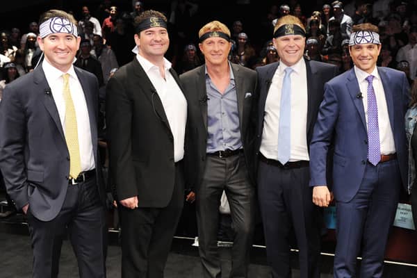 (L-R) Filmmakers Jon Hurwitz and Hayden Schlossberg actor Billy Zabka, filmmaker Josh Heald, and actor Ralph Macchio will be shutting the doors of the dojo as Cobra Kai comes to an end (Credit: Getty Images)