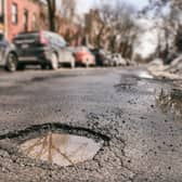 Stock image of a pothole (Photo: Adobe Stock)