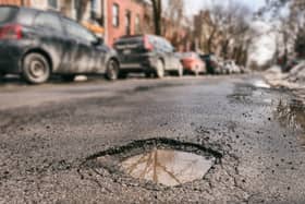 Stock image of a pothole (Photo: Adobe Stock)