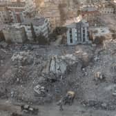 An aerial view of work machines and diggers at the site of collapsed buildings on February 16, 2023 in Hatay, Turkey