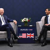 US President Joe Biden and British Prime Minister Rishi Sunak participate in a bilateral meeting during the AUKUS summit on March 13, 2023 in San Diego, California. President Biden hosts British Prime Minister Rishi Sunak and Australian Prime Minister Anthony Albanese in San Diego for an AUKUS meeting to discuss the procurement of nuclear-powered submarines under a pact between the three nations. (Photo by Leon Neal/Getty Images)