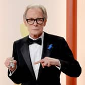 Bill Nighy and his rabbit companion at the 2023 Academy Awards.