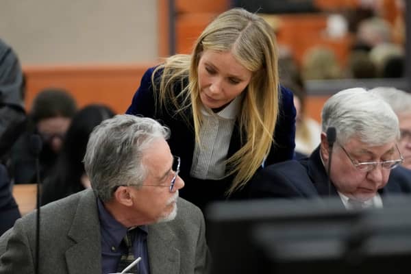 Gwyneth Paltrow appeared to whisper to Terry Sanderson after the verdict of her ski crash legal battle was revealed - Credit: Getty Images