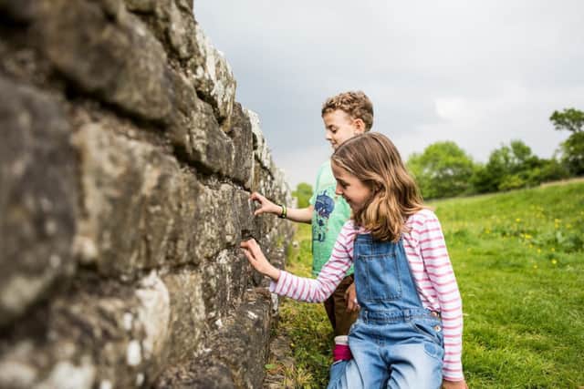 Hadrian's Wall is still a big attraction for young and old (photo: English Heritage)