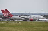 Virgin Atlantic planes sit on the runway at Glasgow Airport.