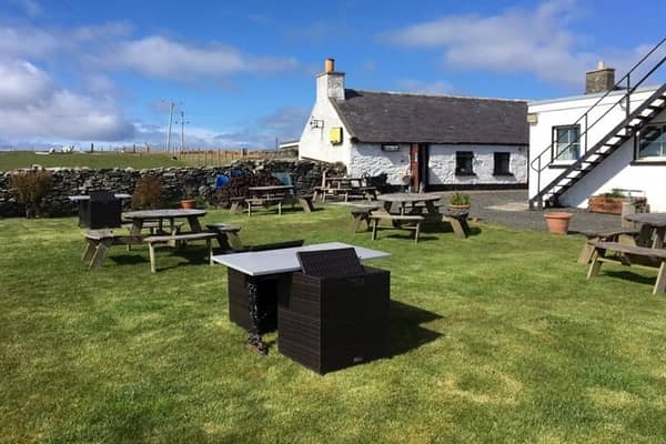 The gastropub is being sold for £399,000 on an island famed for its white sand beaches. It has a gigantic beer garden and a rustic bar and was refurbished during the pandemic.  (Courtesy Alice Bagley / SWNS)