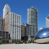 The Cloud Gate sculpture, popularly known as the bean, with Chicago's skyline