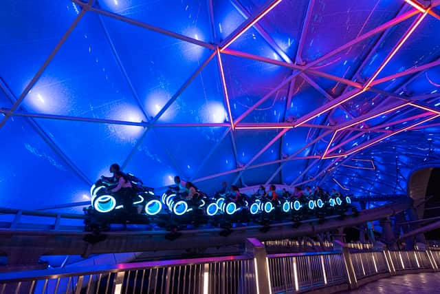 Live the flouro lifestyle at Tron: Lightcycle Run 