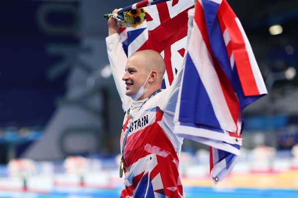 Adam Peaty of Team Great Britain celebrates after winning the gold medal in the Men's 100m Breaststroke Final on day three of the Tokyo 2020 Olympic Games (Photo: Maddie Meyer/Getty Images)