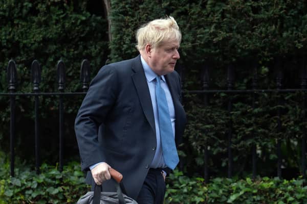 MPs have urged Boris Johnson to pay his own Partygate legal fees