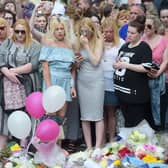 Floral tributes after a minute's silence in St Ann's Square, Manchester, to remember the victims of the terror attack in the city. A report examining security at Manchester Arena where 22 people were murdered and hundreds were injured in a suicide bombing at the end of an Ariana Grande concert in May 2017 was published today. (Photo: PA)