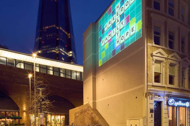 Scrabble project words in London Bridge by The Shard that reflect the mood of the nation as lockdown eases, unveiling its new brand look
