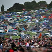 A Glastonbury crew member in his 40s was found dead in his tent on Tuesday.