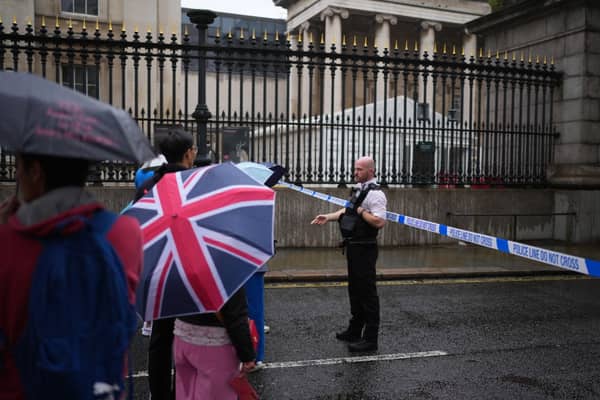 LONDON, ENGLAND - AUGUST 8: Police restrict access outside the British Museum on August 8, 2023 in London, England. The Metropolitan Police said they were called to Museum Street at 10AM after a reported stabbing. A man was subsequently taken to the hospital with a stab wound and another was arrested on suspicion of Grievous Bodily Harm. (Photo by Carl Court/Getty Images)
