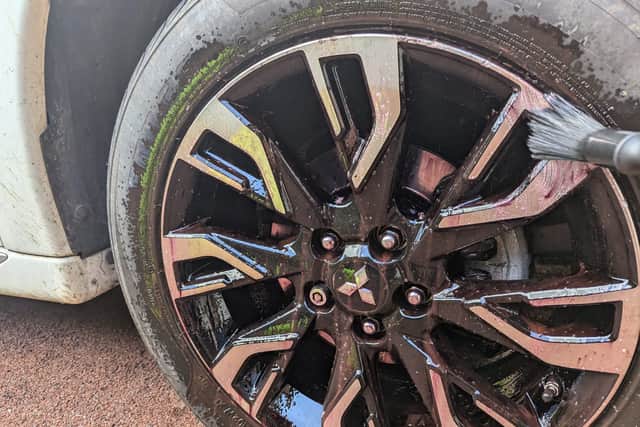 A wheel brush helps to clean between spokes