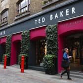 A woman walks past a Ted Baker store in Covent Garden, London (Photo: Peter Nicholls/Getty Images)