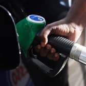 A driver pumps fuel at an Esso Tesco petrol station in 2022 (Photo: Hollie Adams/Getty Images)
