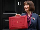 Rachel Reeves poses with the red Budget Box as she leaves 11 Downing Street to present the government's annual Autumn budget to Parliament (Photo: JUSTIN TALLIS/AFP via Getty Images)