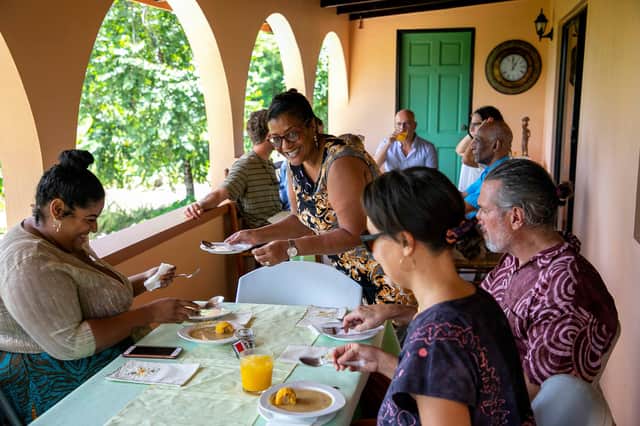 Chef Kennedy and family welcome visitors in their own home in Grenada  to cook home grown produce
