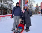 Emily McColgan-Upfold with her husband, Stephen, and son, Finn, in Lapland.
