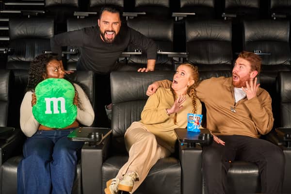 Unsuspecting moviegoers surprised by Rylan were given free treats and cinema tickets