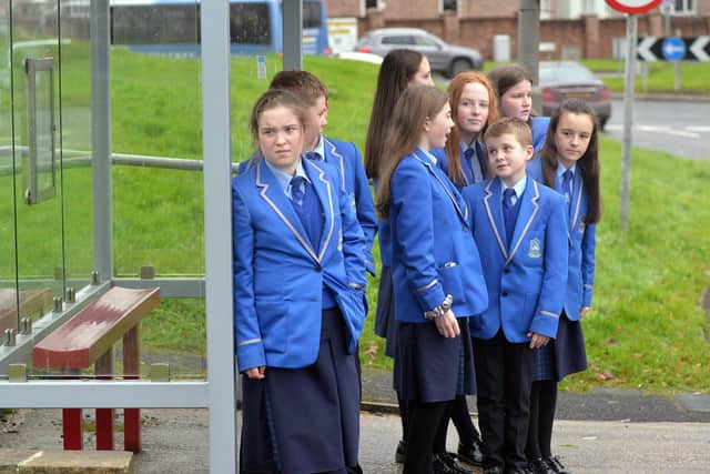 Pupils of St John the Baptist's College from the Maghery Area who are forced to wait until almost 5pm to get a bus home each day. INPT47-204.