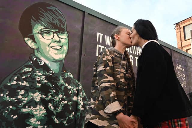 Robyn Peoples and Sharni Edwards at a Lyra McKee mural in Belfast. 
Pic Colm Lenaghan/Pacemaker