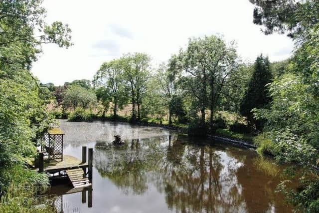 Secluded Detached Period Property set in Mature Gardens with its own Private Lake.