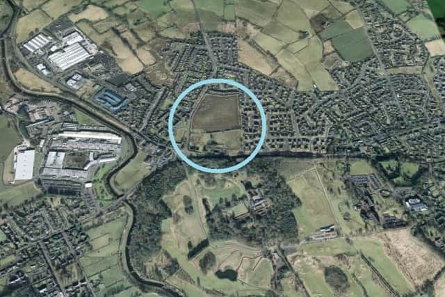 Google Map overview of planning application LA02/2020/0108/F . The lower part of the area circled will be built on. The factory to the west of site belongs to Wrightbus