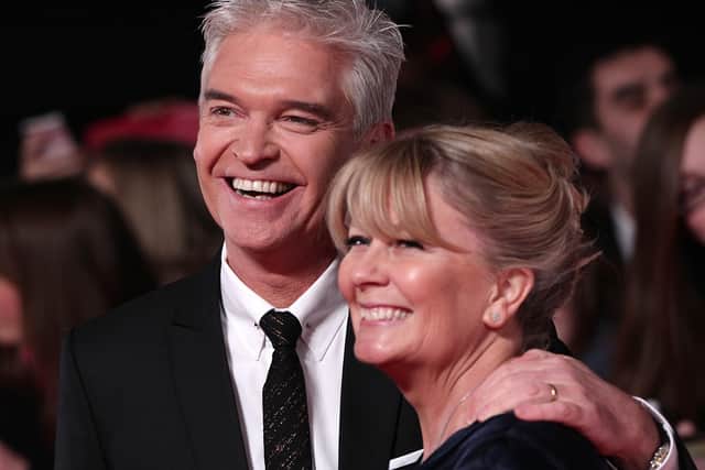 Philip Schofield and wife Stephanie arriving for the 2014 National Television Awards at the O2 Arena, London.