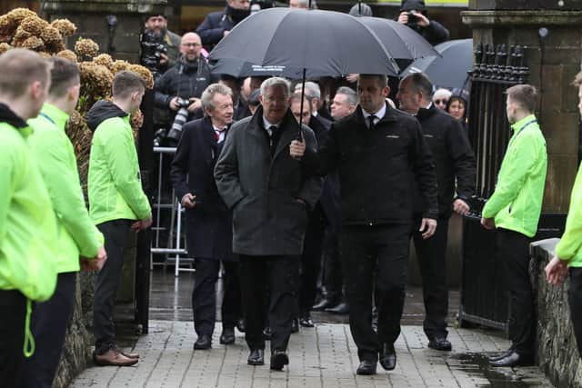 Denis Law and Sir Alex Ferguson arrive for the funeral of former Manchester United and Northern Ireland goalkeeper Harry Gregg, at St Patrick's Parsh Church, Coleraine. PA Photo.