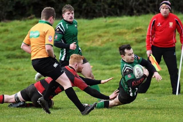 Simon Logue dives over the Tullamore line to score Derry's third try of the match against Tullamore on Saturday. DER0920-105KM
