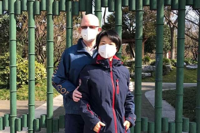 Stephen Graham and his wife, Christina Wu, enjoy a walk in Shanghai