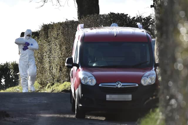 A PSNI forensics officer at the scene. (Photo: Pacemaker)