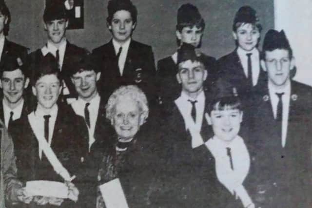 Tom McDowell and Margaret McCartney receive a cheque on behalf of the Tower House Fund from members of Second Ballymena BB. Making the presentation is Lee Eagleson.
1989