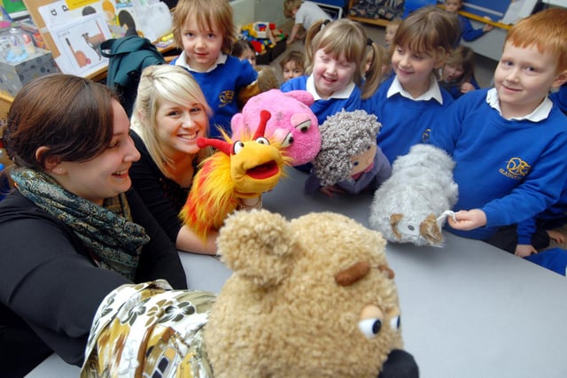 Pupils at Gladstone Road Infants School learn about puppets with Diana Logan, who introduces the puppets to the children.