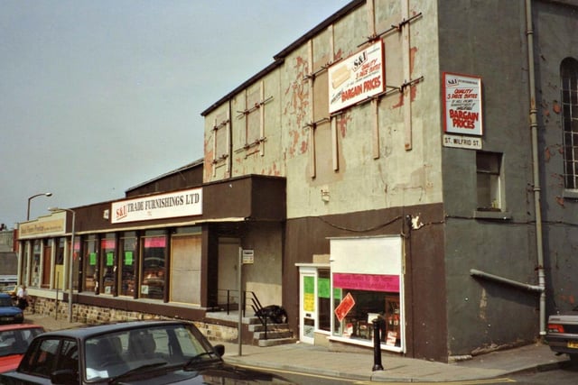 This was the junction of Charnley Street and St. Wilfrid Street, Preston in May 1990. Ideal Floors, Preston and S&I Trade Furnishings Ltd are occupying what used to be the car showroom for Loxhams Central Garage. Image & comment courtesy of Paul Grogan and Preston Digital Archive