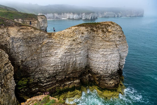 he East Yorkshire coastline has plenty of natural wonders, and Flamborough Head is one of the finest. Nestled between Filey and Bridlington, it looks out into the North Sea, offering up incredible rock formations, including a captivating arch, and beautiful white cliffs that go all the way up to Bempton