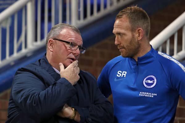 Simon Rusk (right) with Steve Evans.