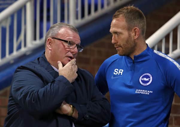 Simon Rusk (right) with Steve Evans.