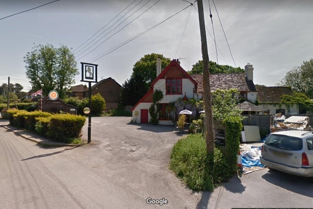 The White Horse.
Park Lane, Maplehurst, Horsham RH13 6LL.
A 4.5 star rating on Trip Advisor with one reviewer calling it "a classic English rural pub".
Photo from Google Maps street view.