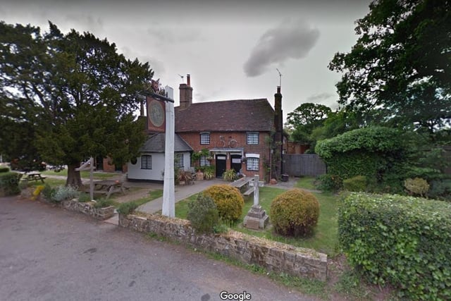 The George and Dragon.
Dragons Lane Shipley, Horsham RH13 8GE.
A 4.5 star rating on Trip Advisor with one reviewer calling it a "warm and welcoming country pub".
Photo from Google Maps street view.
